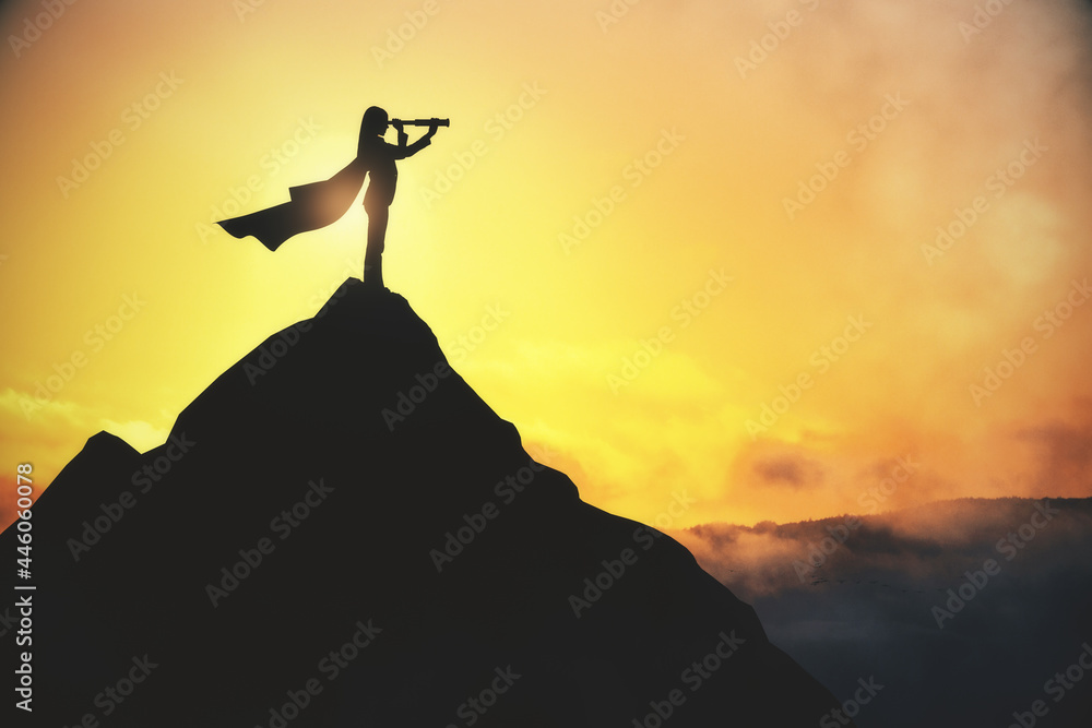 Businesswoman with telescope standing on creative backlit mountain and sunset background with mock u