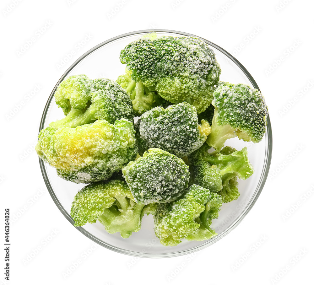 Bowl with frozen broccoli on white background