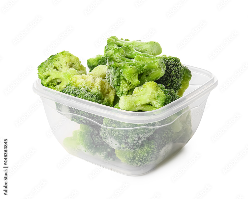 Container with frozen broccoli on white background