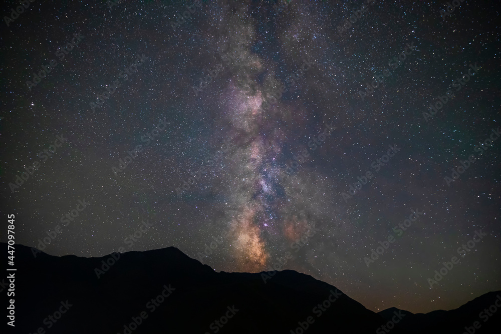 Milky way over mountains in summer