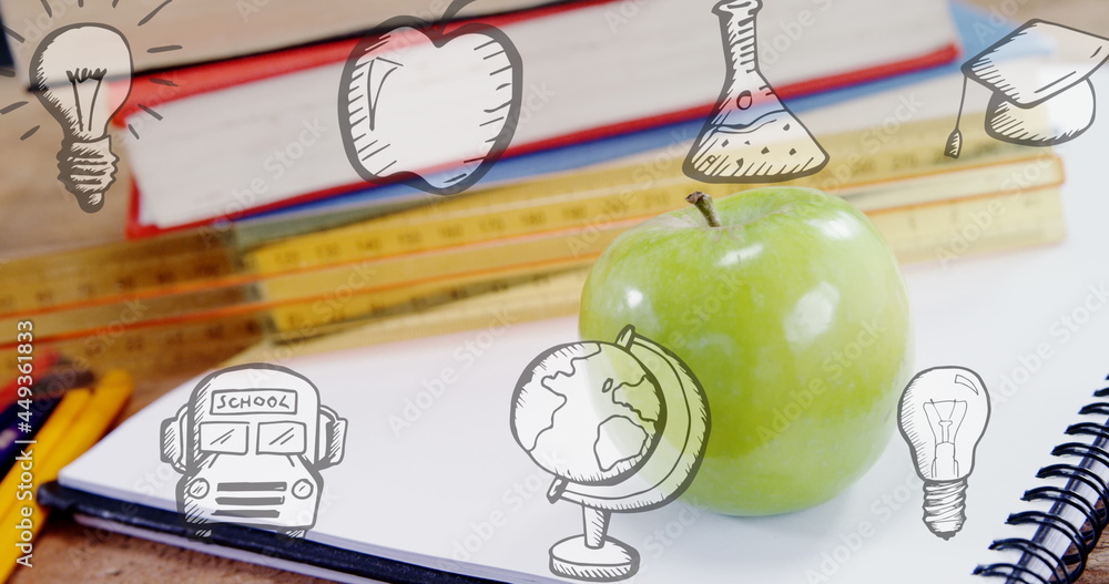 桌面上有书本和苹果的学校物品图标图像