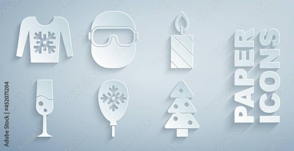 用雪花、燃烧的蜡烛、一杯香槟、圣诞树、滑雪镜和swe设置气球