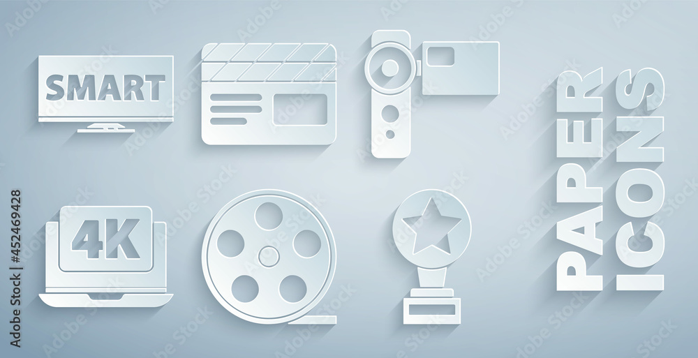 设置电影卷轴、电影摄像机、带4k视频的笔记本电脑、电影奖杯、拍板和屏幕电视智能图标。