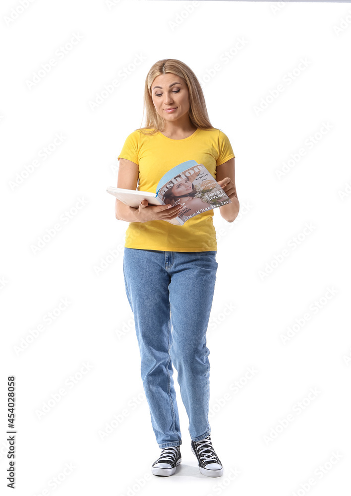 Woman with magazine on white background