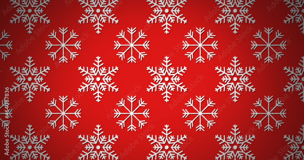 红色背景下雪花编队移动的圣诞装饰图案图像