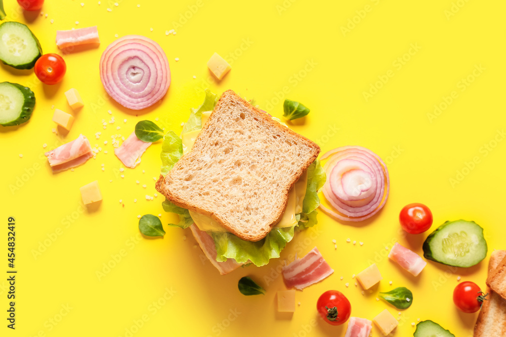 以美味的三明治和蔬菜为背景的成分