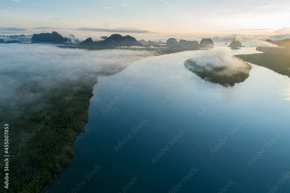 Aerial view drone shot of beautiful ocean against sky in the morning fog mist sunrise drone is flyin