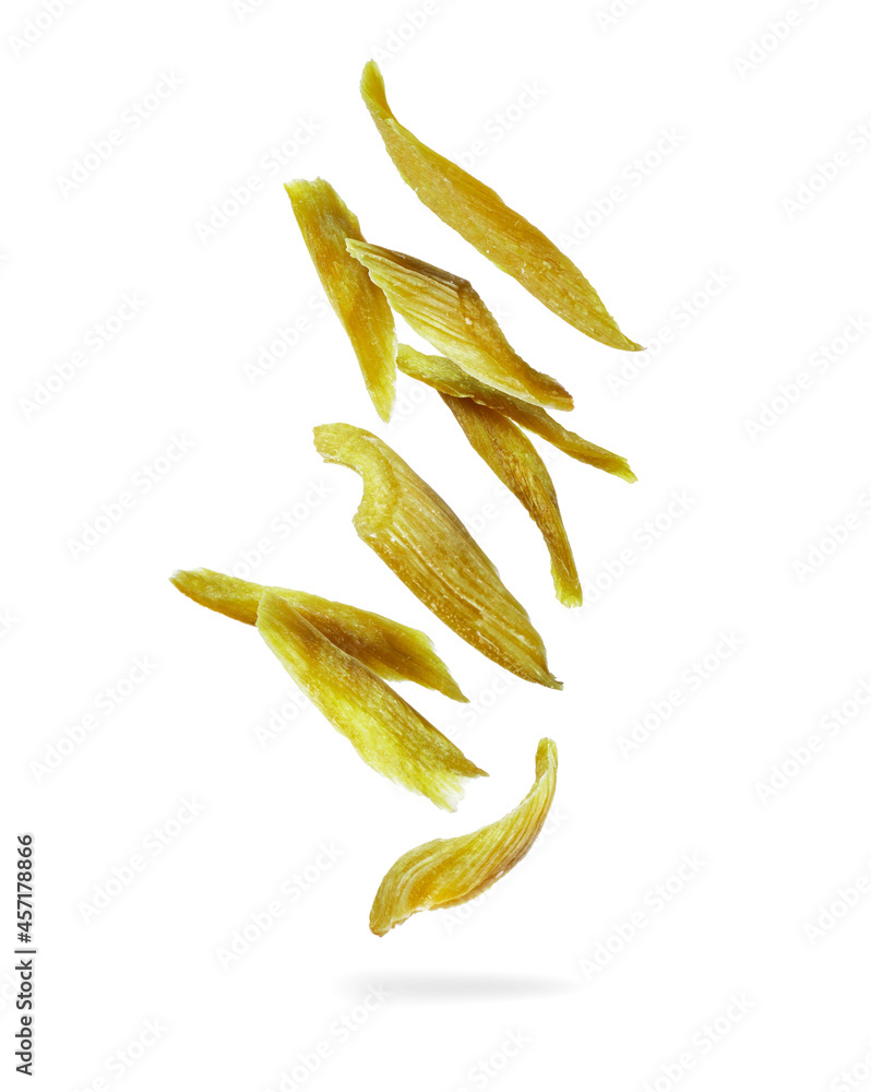 Dried candied rhubarb in the air, isolated on a white background