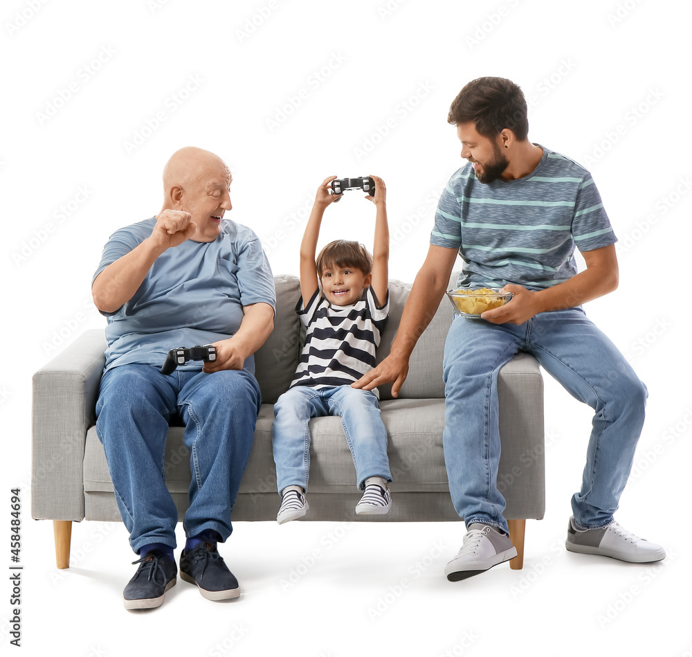 Happy man, his little son and father playing video game on white background