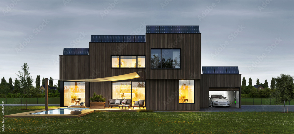 带太阳能电池板和电动汽车的现代住宅豪华外部夜景