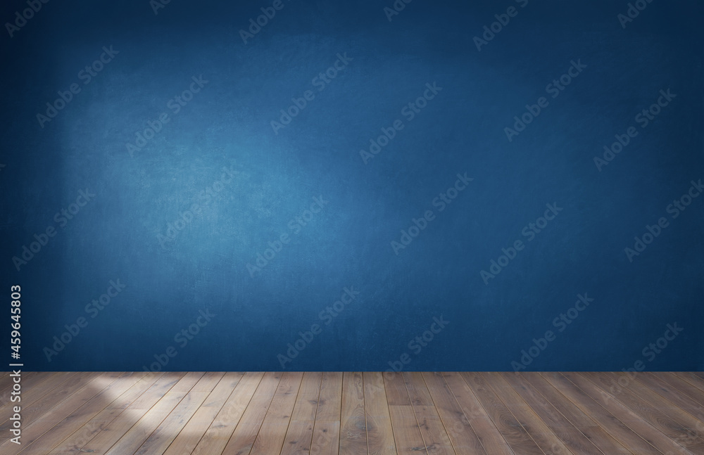 木地板空房间里的深蓝色墙壁