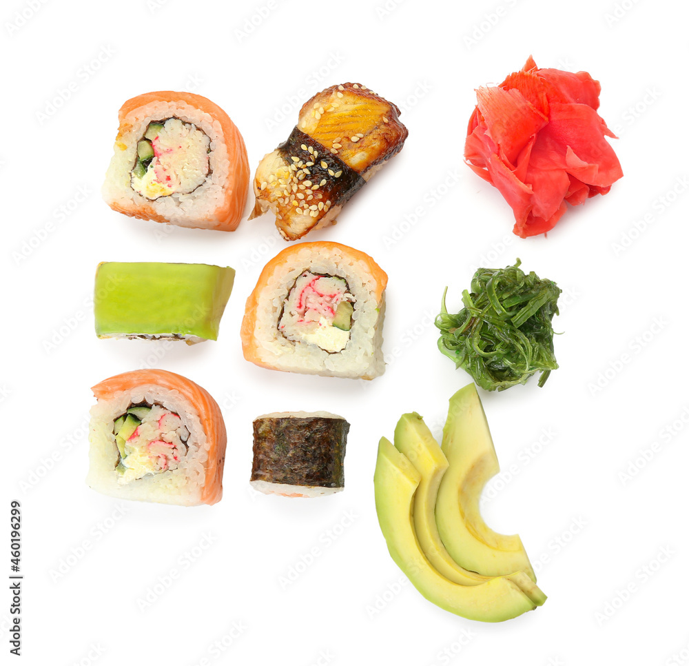 不同的寿司、卷、生姜、chukka和白底鳄梨片