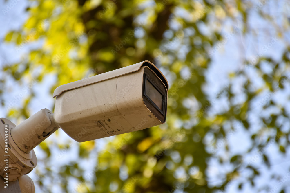 Security system of outdoor video surveillance, CCTV Security Camera on outdoors background