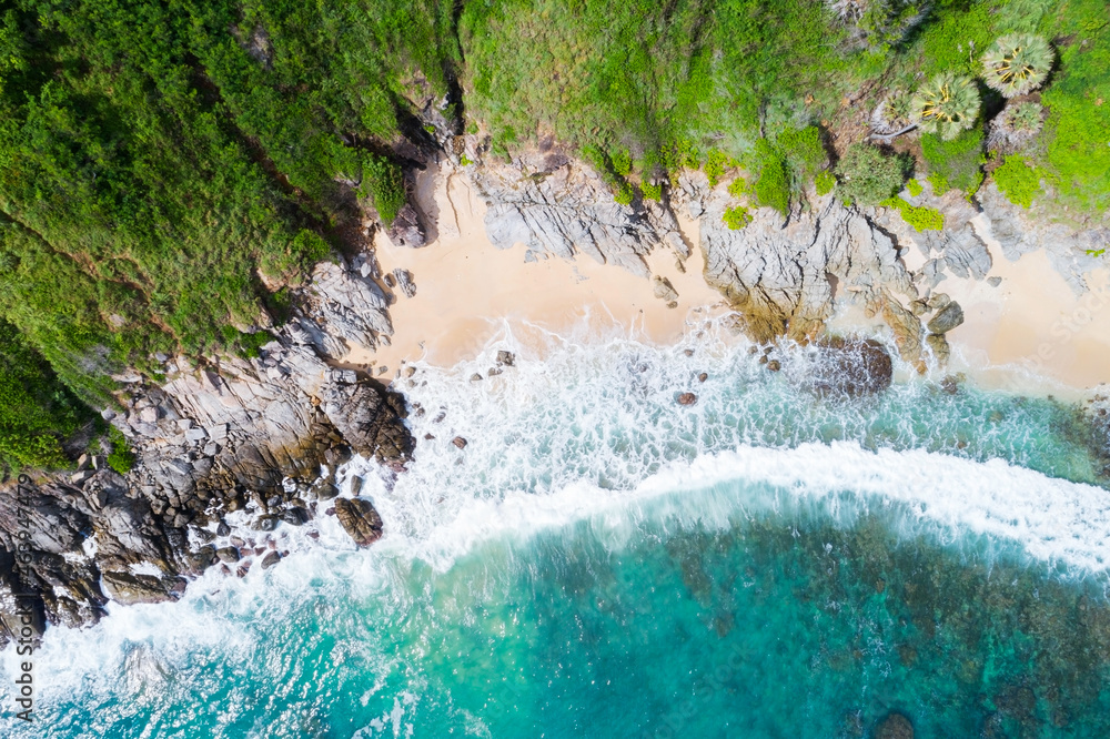 Amazing Sea aerial view Top down seashore nature background Beautiful Tropical beach with rocky moun