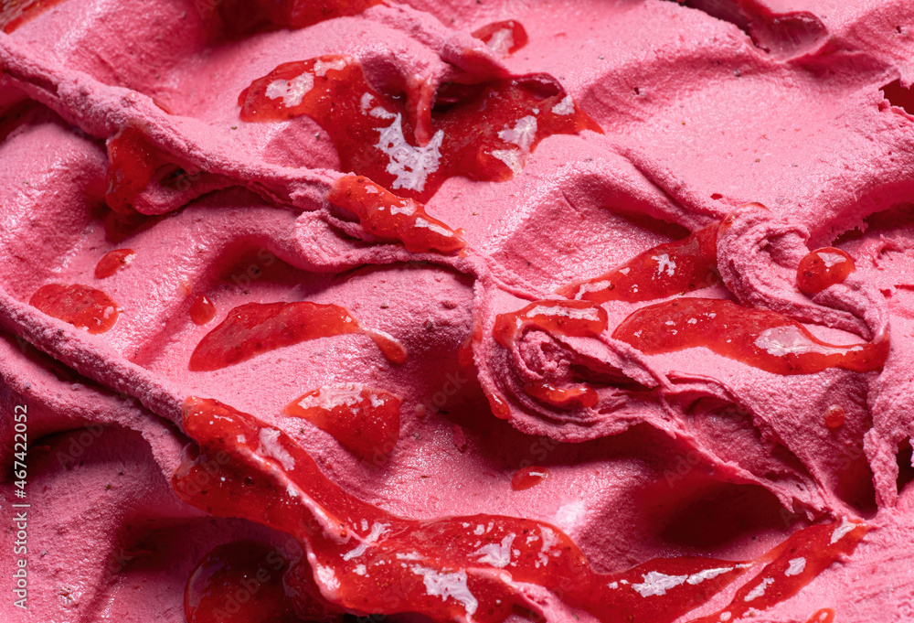 冷冻草莓口味冰淇淋-全框架细节。冰淇淋粉红色表面纹理的特写