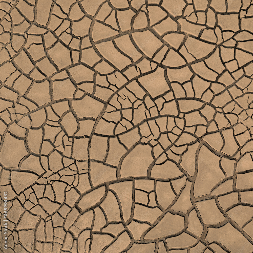 Natural cracks pattern, dried wasteland with cracked brown mud surface