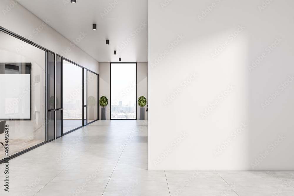现代白色混凝土办公室内部走廊，墙上有空的实体模型，玻璃，隔断