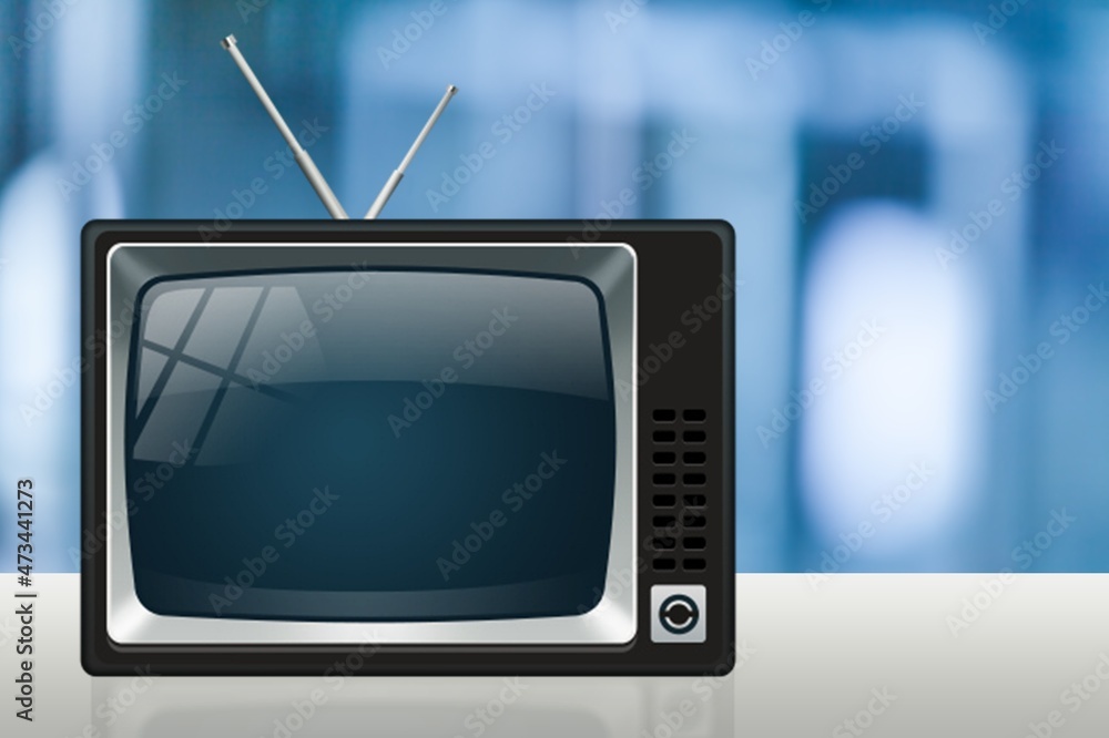 桌子上屏幕上杂乱的20世纪70年代的旧电视