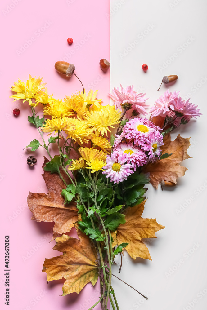 以美丽的菊花和秋天的叶子为背景的构图