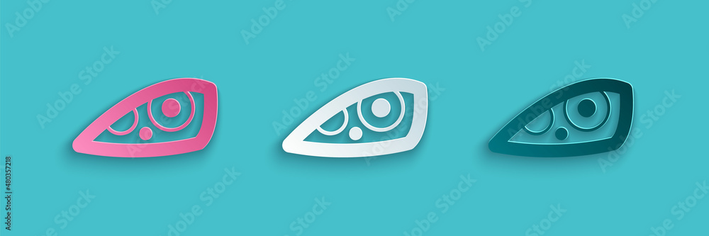 Paper cut Car headlight icon isolated on blue background. Paper art style. Vector