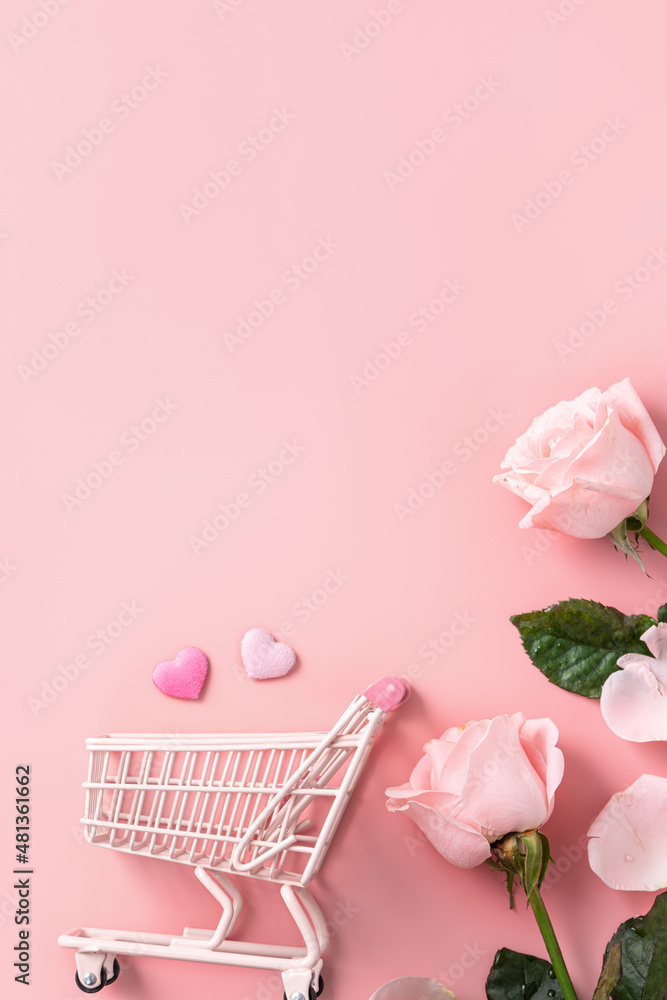 情人节购物设计概念背景，粉色玫瑰花和粉色背景的购物车
