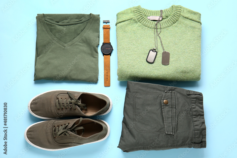 彩色背景的男性衣服、鞋子和手表