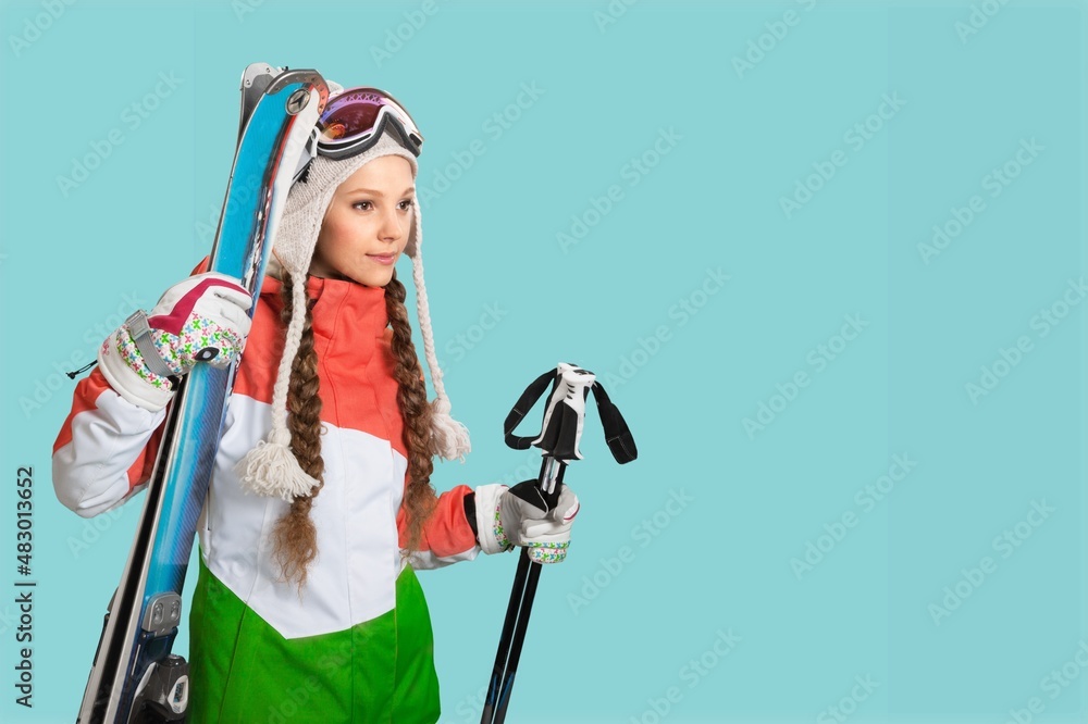 Skier satisfied happy sporty woman in warm jacket spend extreme weekend in mountains hold ski