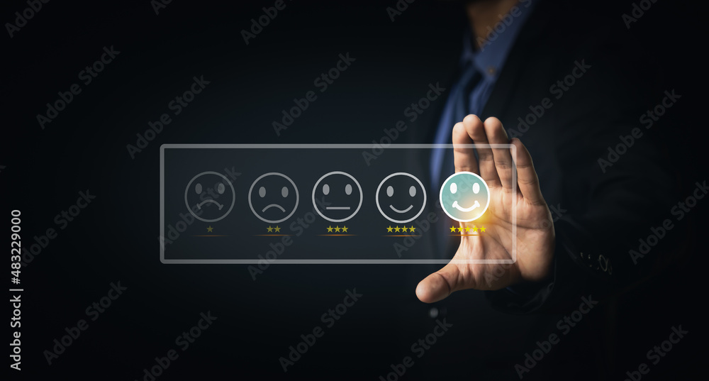 Customer Service and Satisfaction Concept Businessmen touch the virtual screen on happy smiley icons