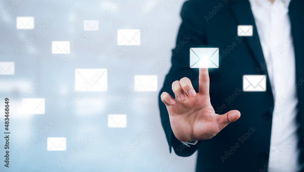 e-mail and marketing concept. Double exposure Businessman touch Email pressing for sending the e-mai