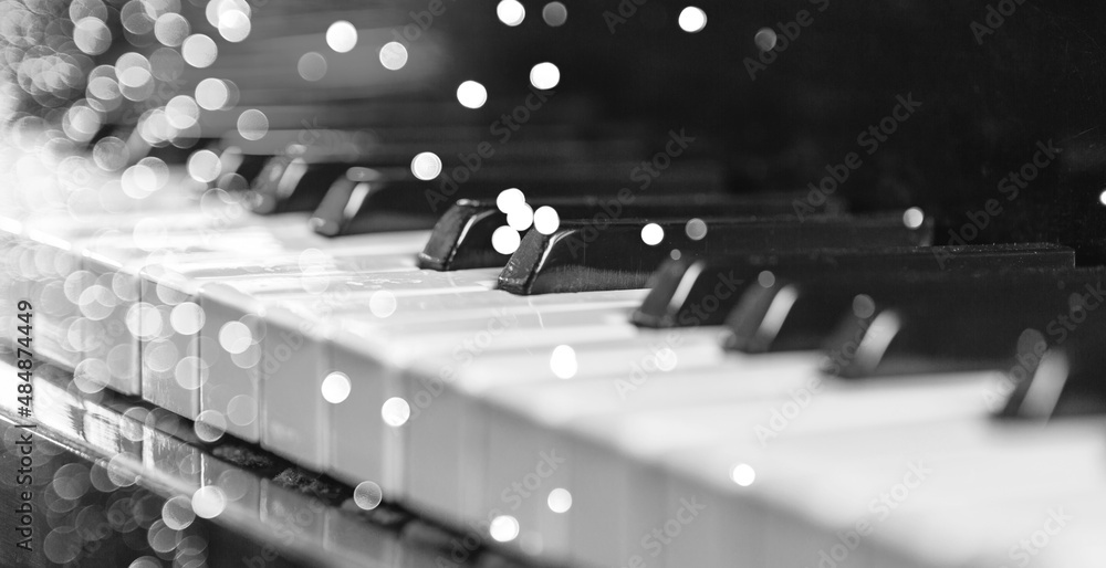 Piano keyboard background. Piano keys with lights