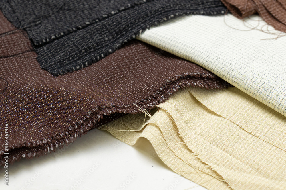 折叠织物纹理背景。这些织物由棉和聚酯制成。
