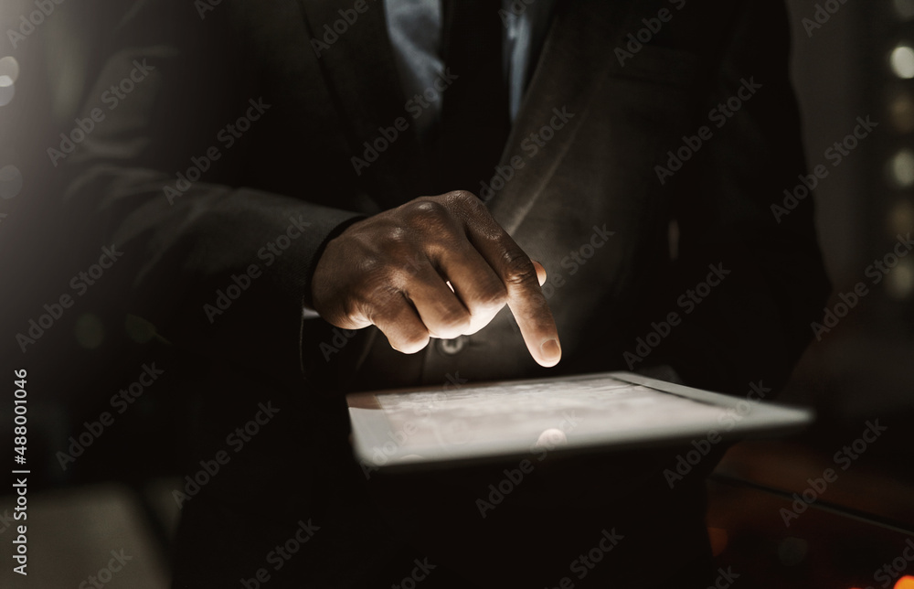 Prepared to do business. Cropped shot of an unrecognizable businessperson browsing on a digital tabl