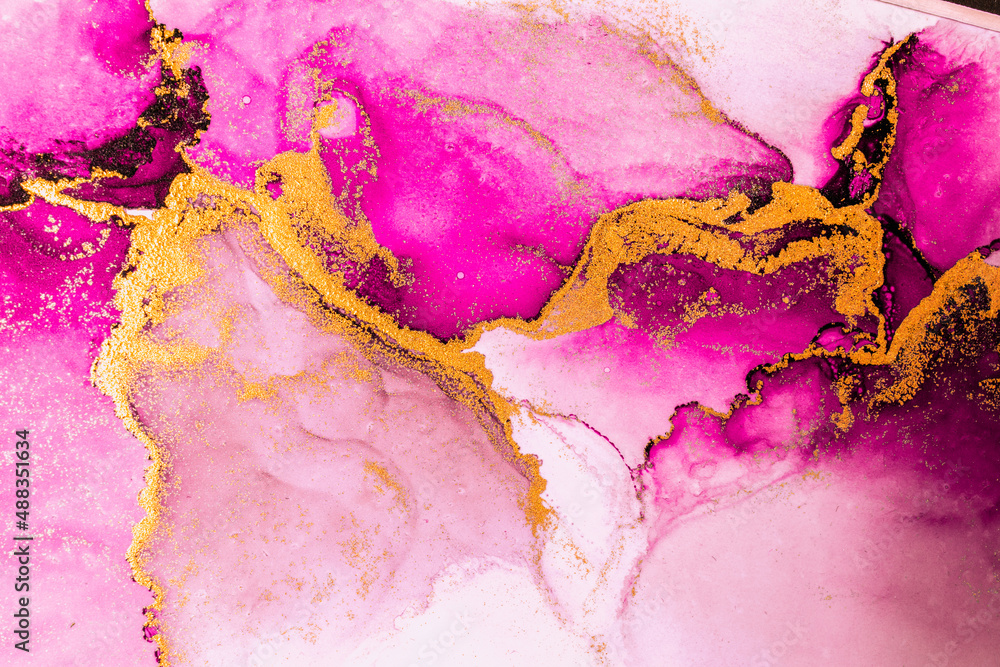 Pink gold abstract background of marble liquid ink art painting on paper . Image of original artwork