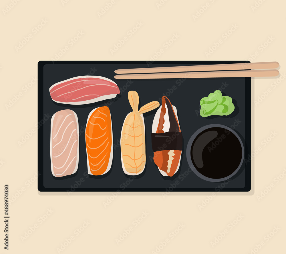 一套传统的日本菜，卷和寿司配海鲜。放在一个黑色盘子里。卡通手d