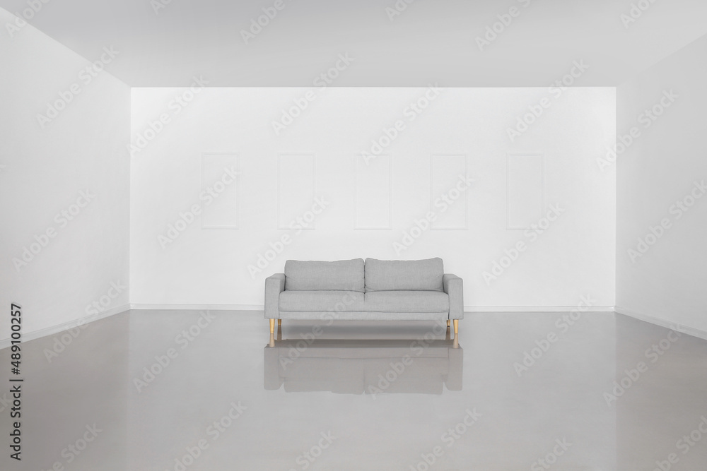 View of empty room with grey sofa