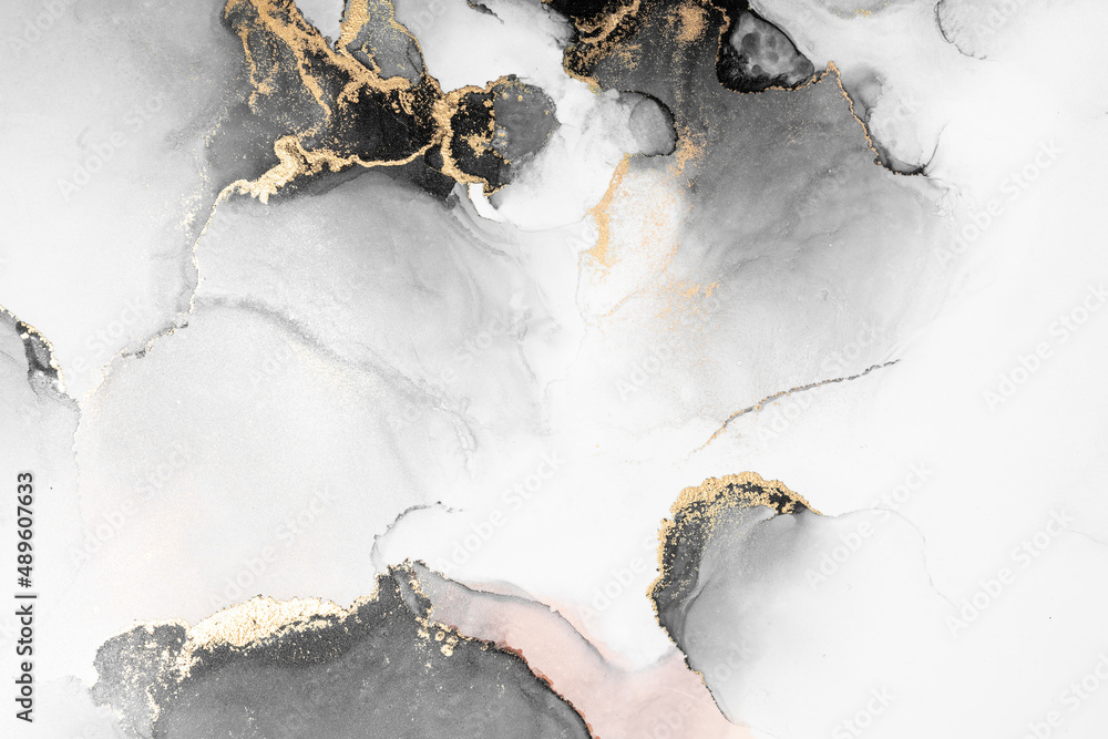 Black gold abstract background of marble liquid ink art painting on paper . Image of original artwor