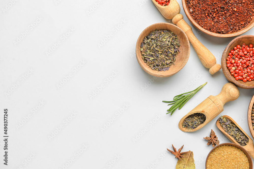 Set of aromatic spices and herbs on white background
