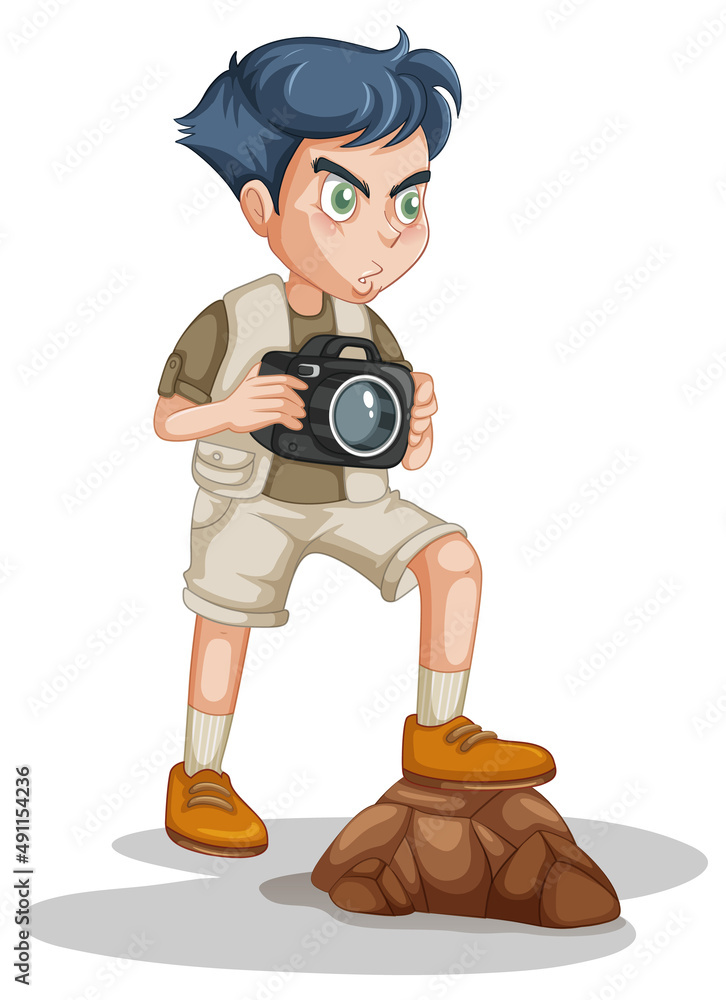Boy in scout uniform holding camera