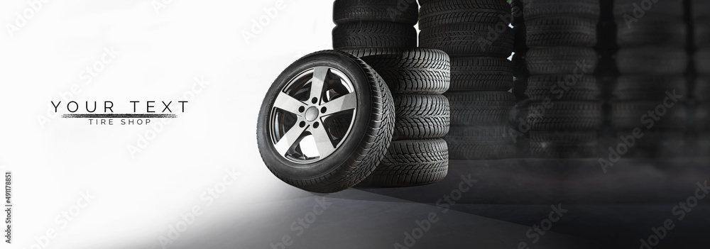 轮胎店、汽车服务和汽车车轮轮胎店设计。一堆汽车黑色橡胶轮胎广告