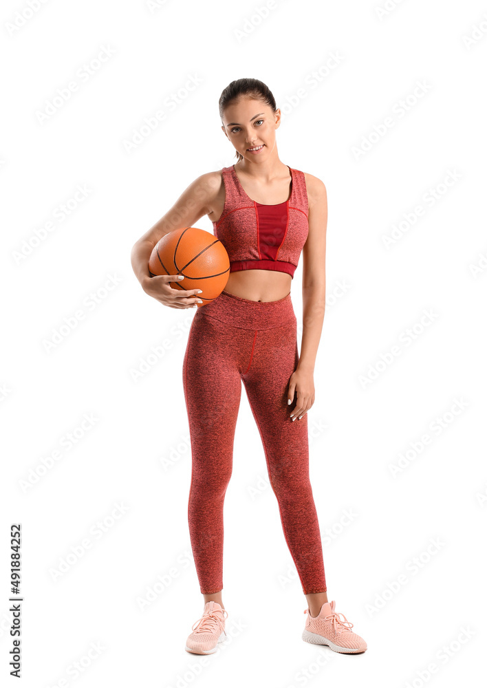 Sporty teenage girl with ball on white background