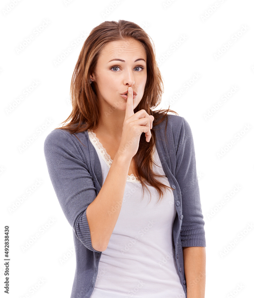 这是最高机密。一个穿着便装的女人用手指放在嘴唇上做手势——孤立在白色上。