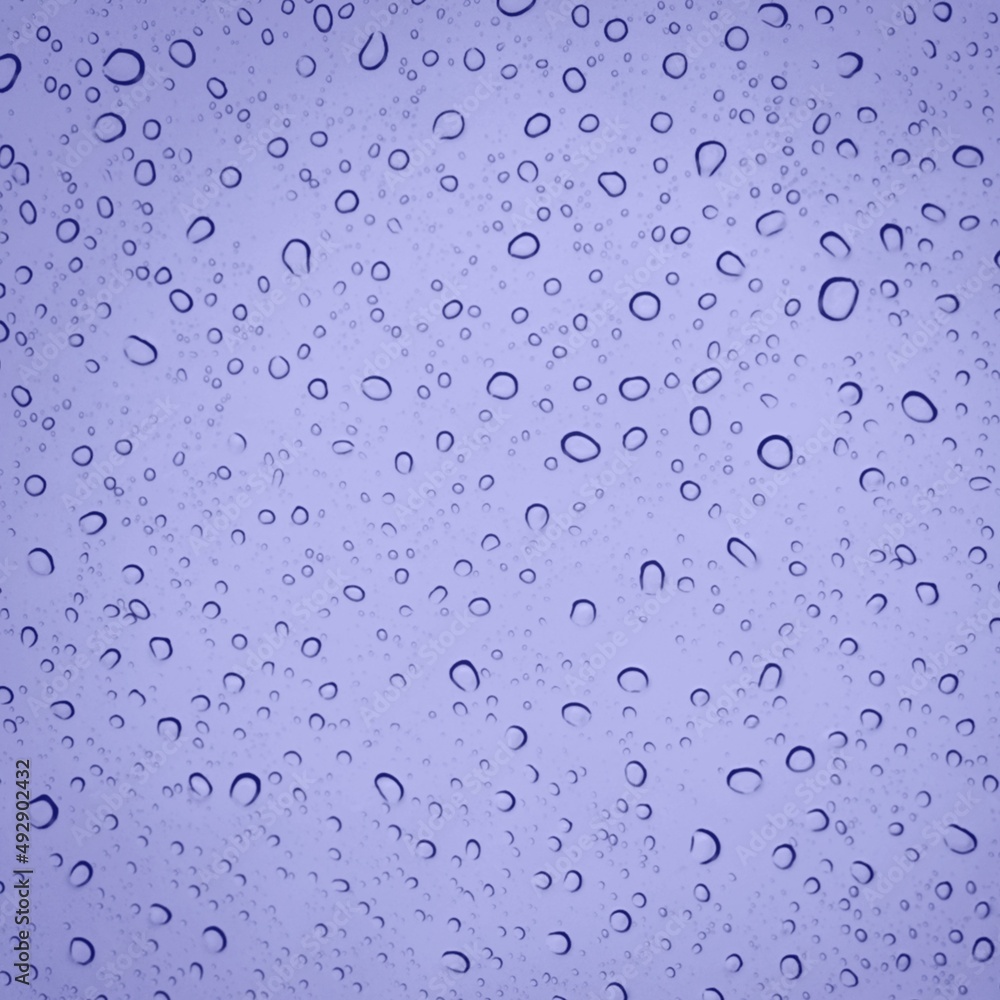 非常接近紫罗兰色的水滴，抽象的背景或纹理概念。
