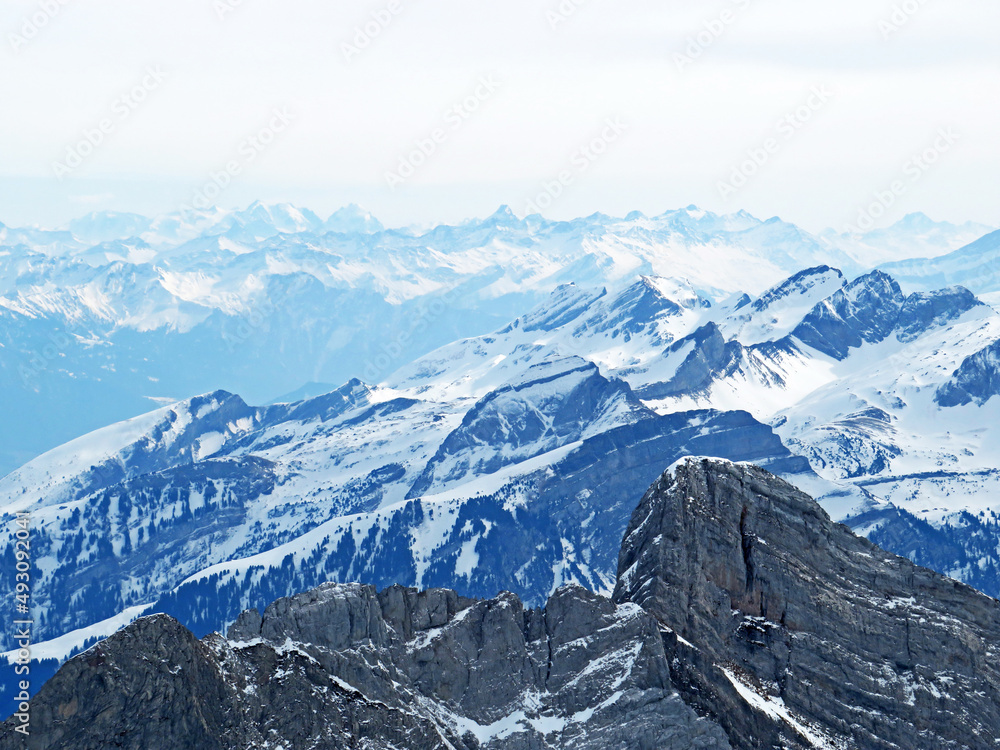 View of the snowy alpine peaks from Säntis, the highest peak of the Alpstein mountain range in the S