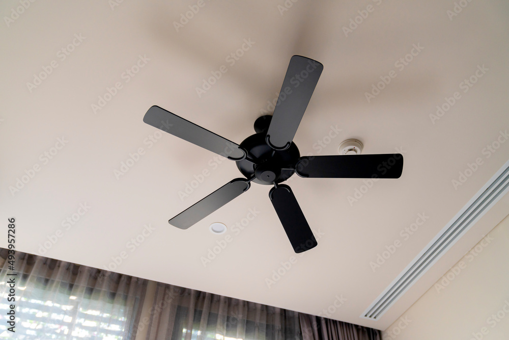 Moving ceiling fan in a hotel room,indoor hanging decorate ceiling fan install in bedroom hotel inte