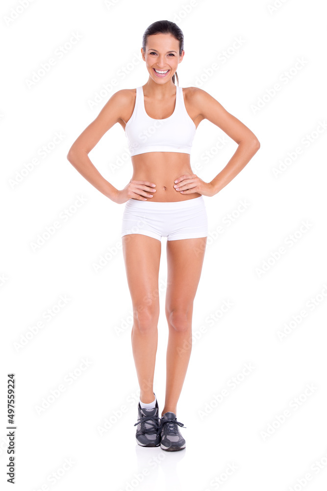 健康身材的海报女孩。一位穿着运动装备的健康年轻女性的工作室肖像被隔离在wh上