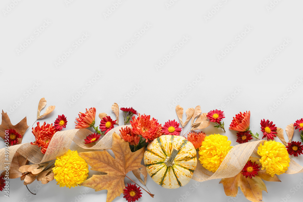 白底菊花、南瓜和树叶的构图