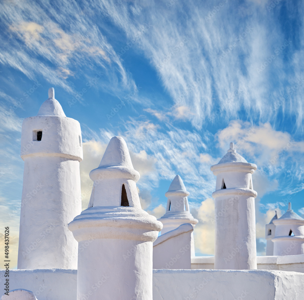 Colahonda - the beautiful coastal city of Andalusia, Spain. Beautiful chimneys and ventilation tubes
