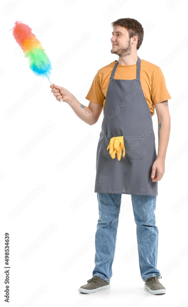 Young man with dust brush on white background