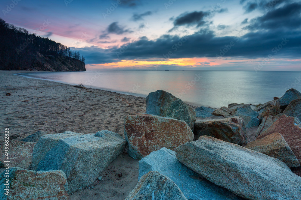 Beautiful landscape of the beach at Orlowo cliff before sunrise, Gdynia. Poland