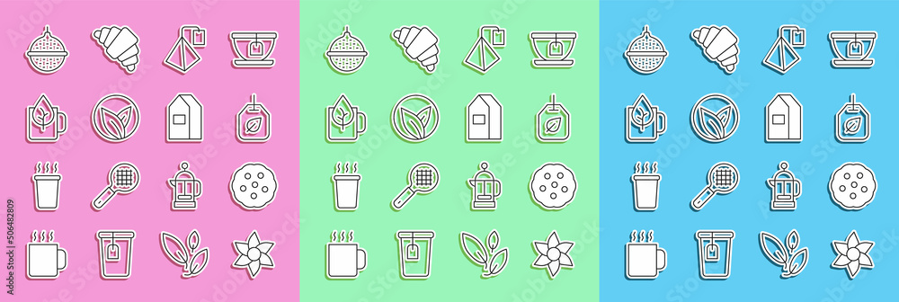 定线花、饼干或饼干、带叶子的茶包、一杯茶、滤球器和纸包装f